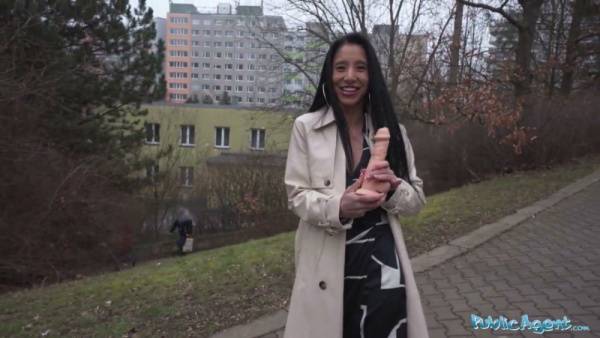 Asian woman deep-throats a realistic dildo on a public pathway on adultfans.net