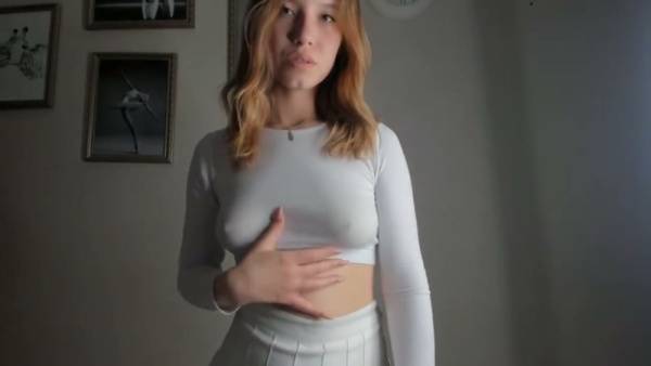 Blonde yogi stretches in white crop top and skirt with no underwear beneath on adultfans.net