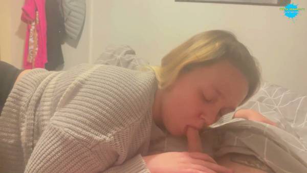 Voluptuous young girlfriend gives passionate blowjob to her boyfriend on the bed on adultfans.net